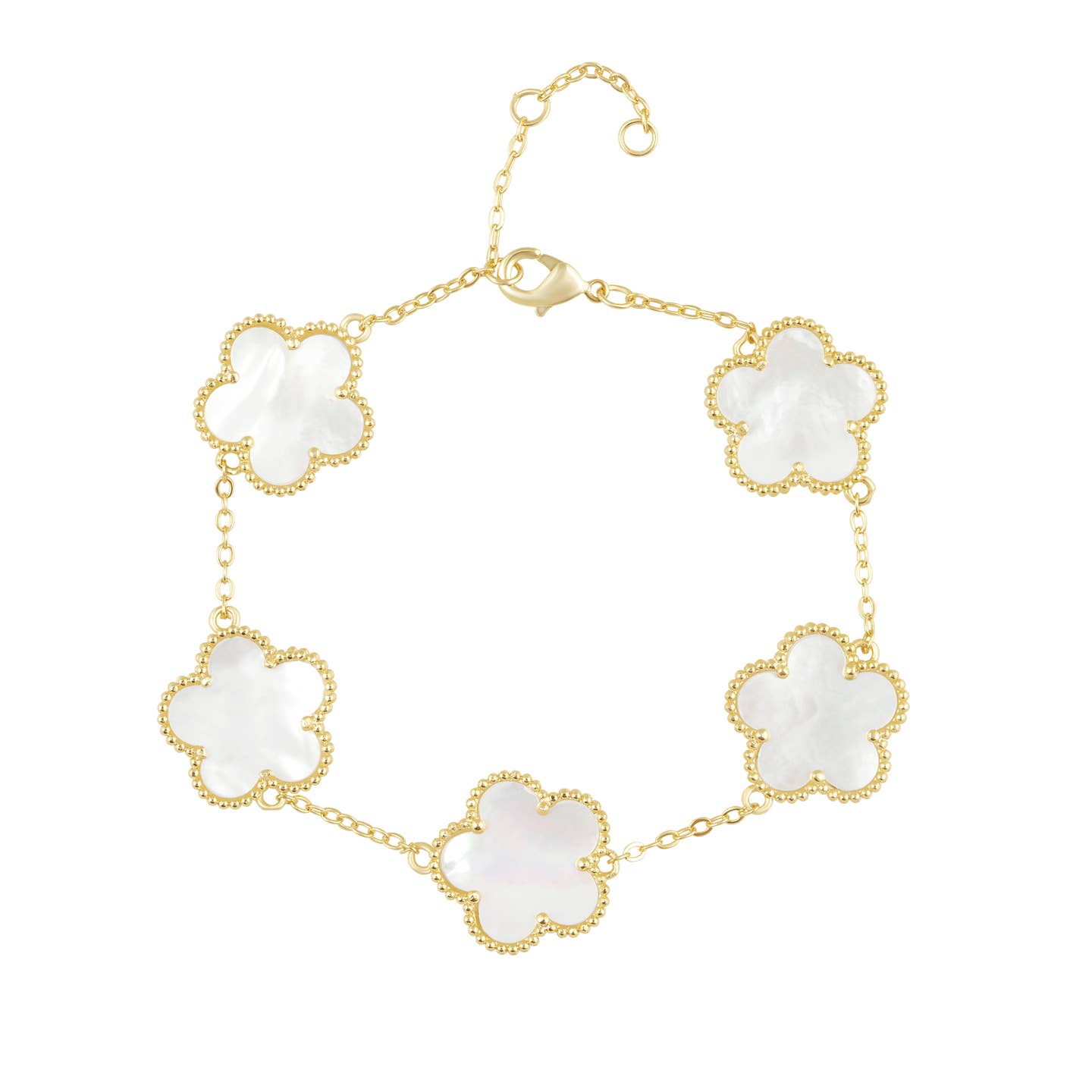 Gold bracelet with white flower-shaped links on a white background